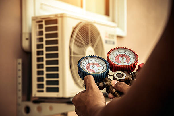 Professional Emergency Hvac technician working in Owens Cross Roads, AL